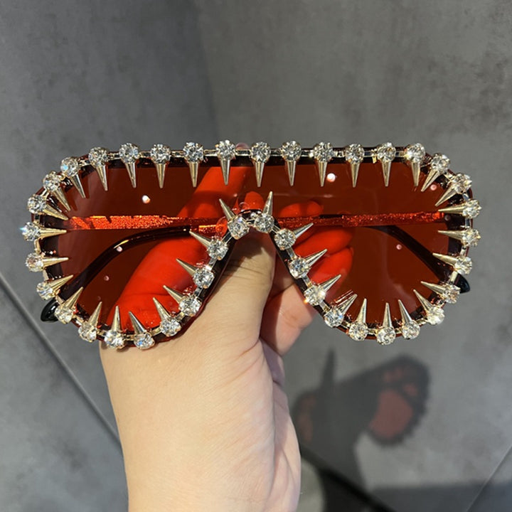 Ladies extravagantly designed cat-eye sunglasses with glitter accents Bowlift