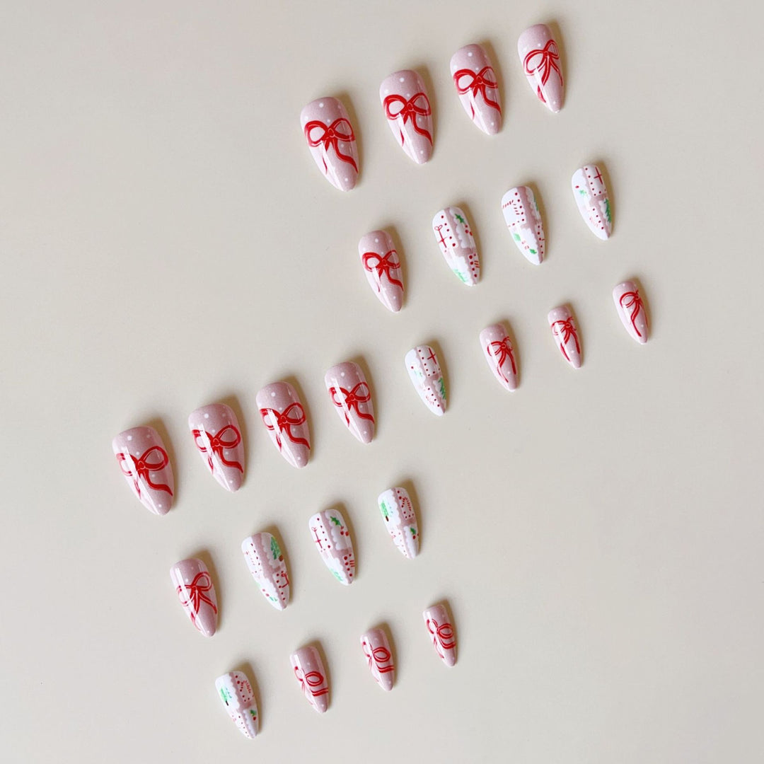 Artificial nail set with festive gift and bow motifs Bowlift