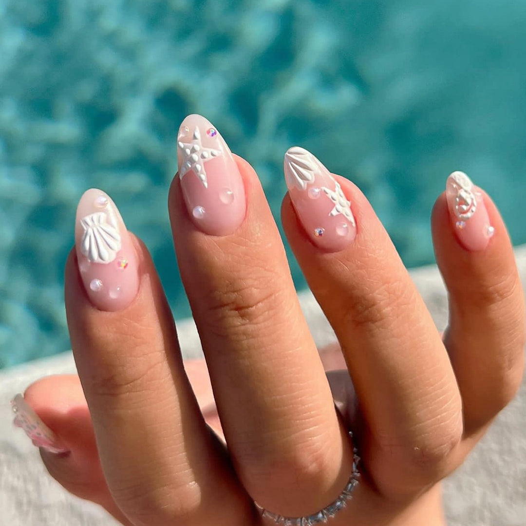 Artistic nail designs with shell and star motif Bowlift