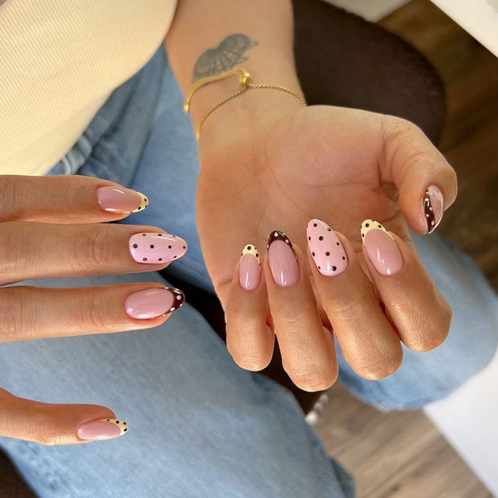Glamorous stiletto nails with elegant star design Bowlift