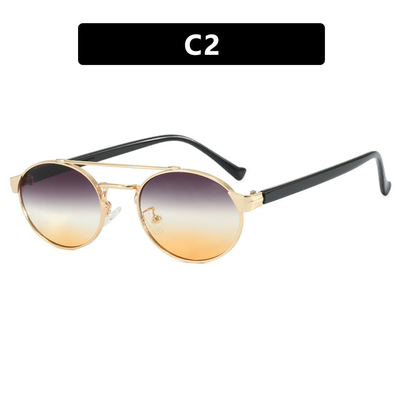 Ladies fashionable sunglasses in stylish round design with golden accents Bowlift