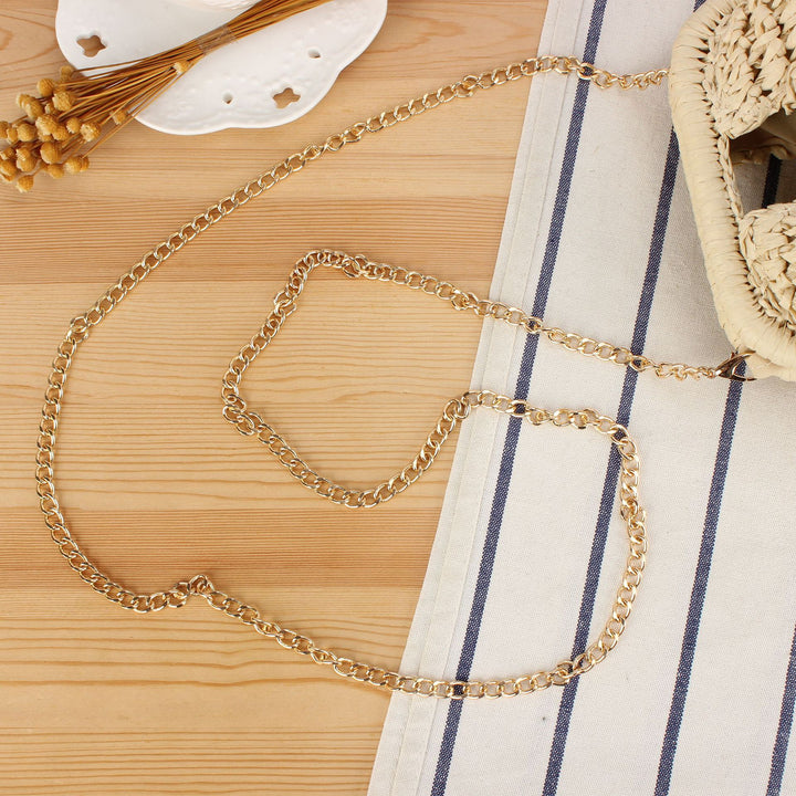 Shoulder bag made of hand-knotted natural material with elegant chain strap Bowlift