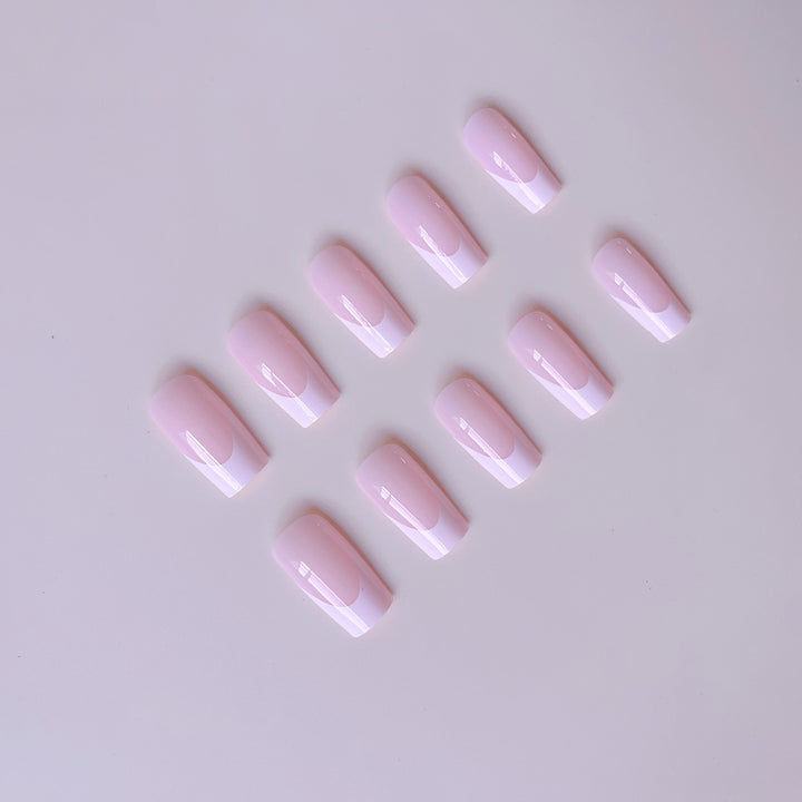 Acrylic nail set with modern French design and revitalizing accents Bowlift