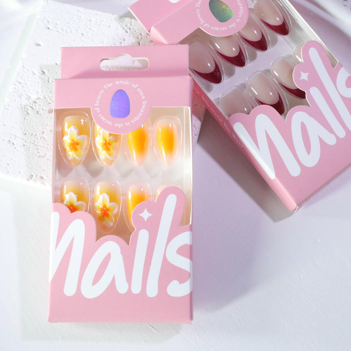 Artful nail extensions with delicate ombre effect and floral accents Bowlift