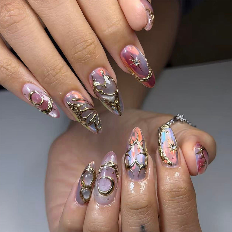 Elegant and creative artificial nails with metallic accents Bowlift