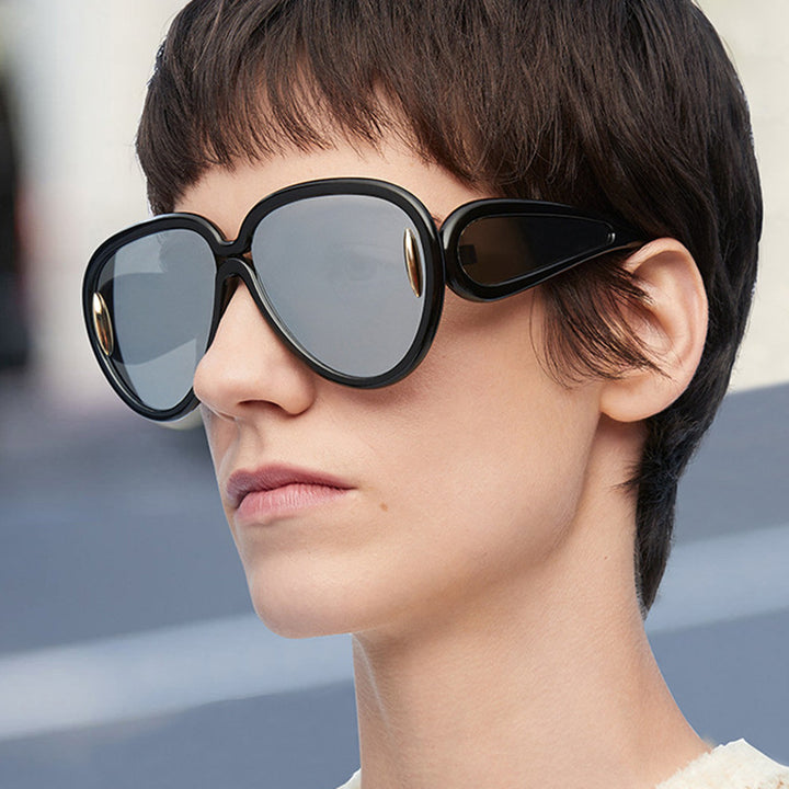 Women extravagant sunglasses in creative design Bowlift