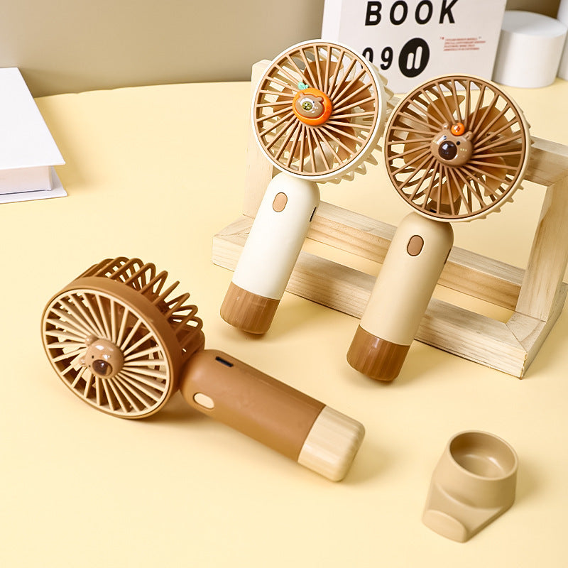 Cooling portable rechargeable handheld mini fan with detachable base stand cute animal-face safety grille USB-C charging Bowlift