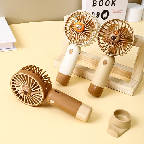 Cooling portable rechargeable handheld mini fan with detachable base stand cute animal-face safety grille USB-C charging Bowlift