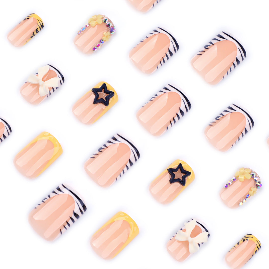 Artistic Nail Art with Glitter and Floral Accents Bowlift