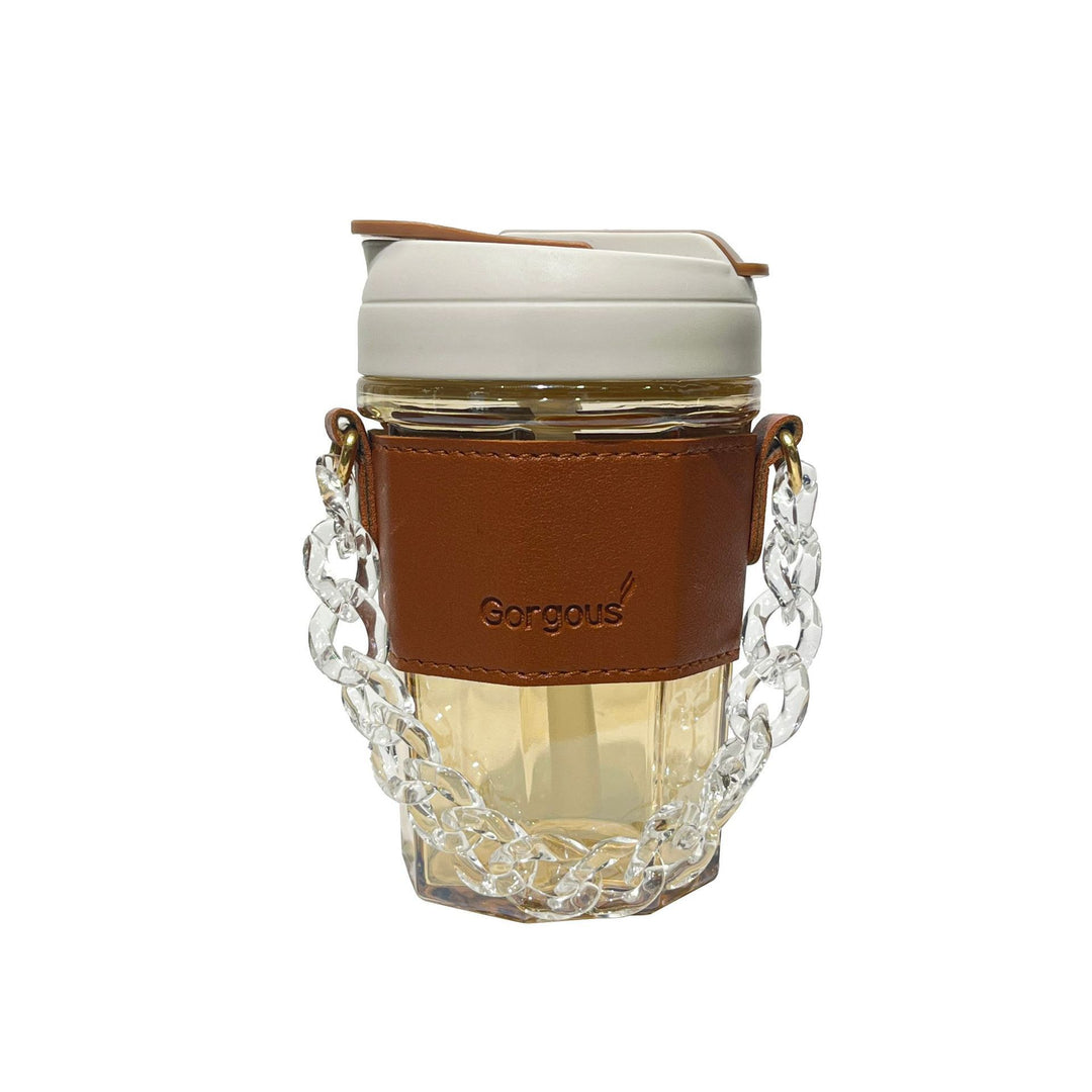 Women drinking cup with elegant leather handle and practical carrying chain Bowlift