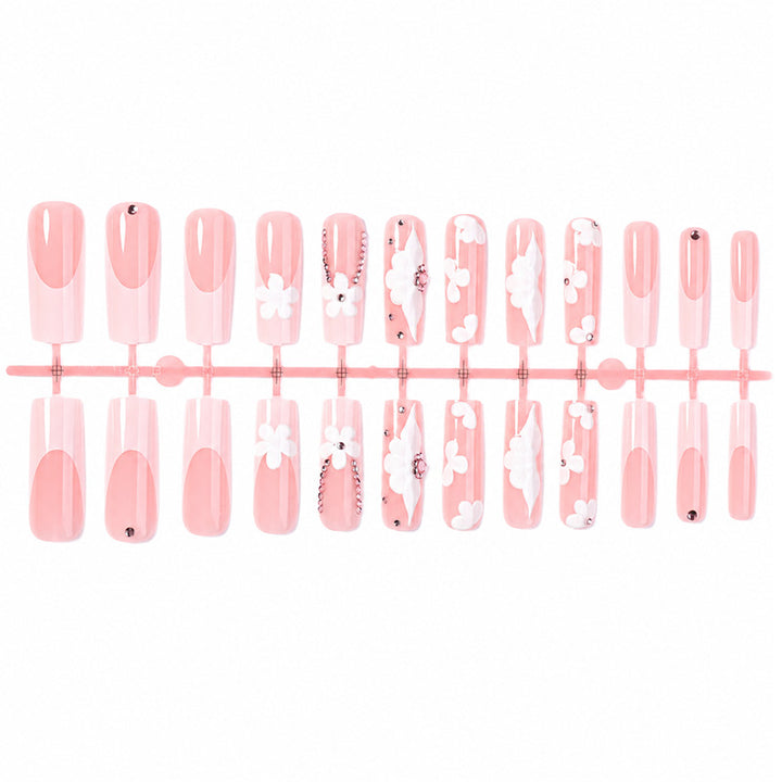 Artificial nail set with delicate flower and glitter details Bowlift
