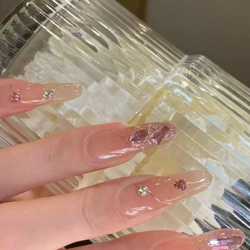 Artistic Nail Extensions with Glitter Accents Bowlift