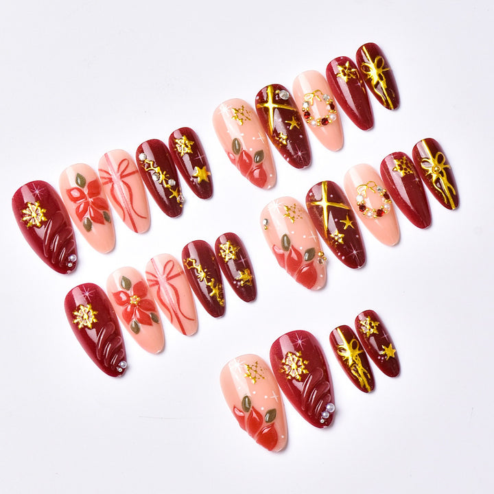 Artificial nail set in festive winter design with glamorous accents Bowlift