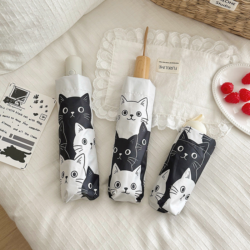 Women Folding Umbrella with Playful Cat Pattern Bowlift