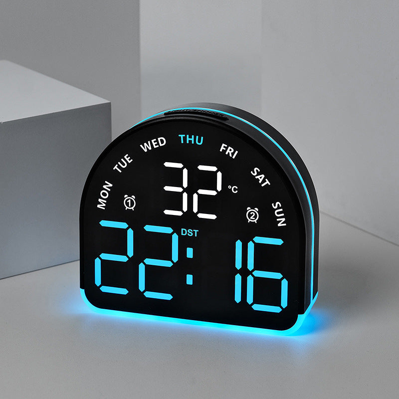 Digital alarm clock with temperature and day of the week display Bowlift
