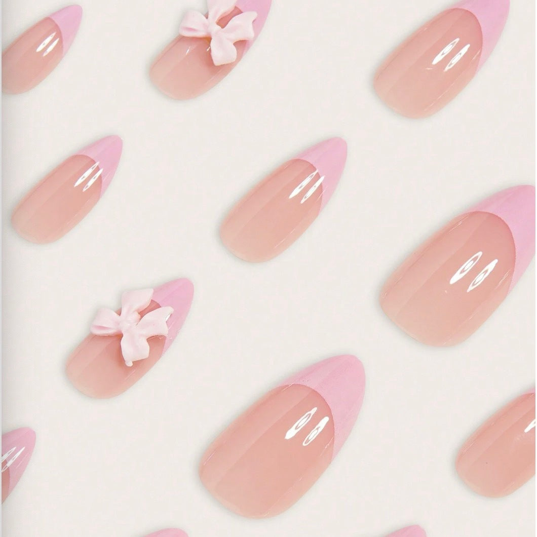 Nail art set with playful ribbons and shiny decorations Bowlift