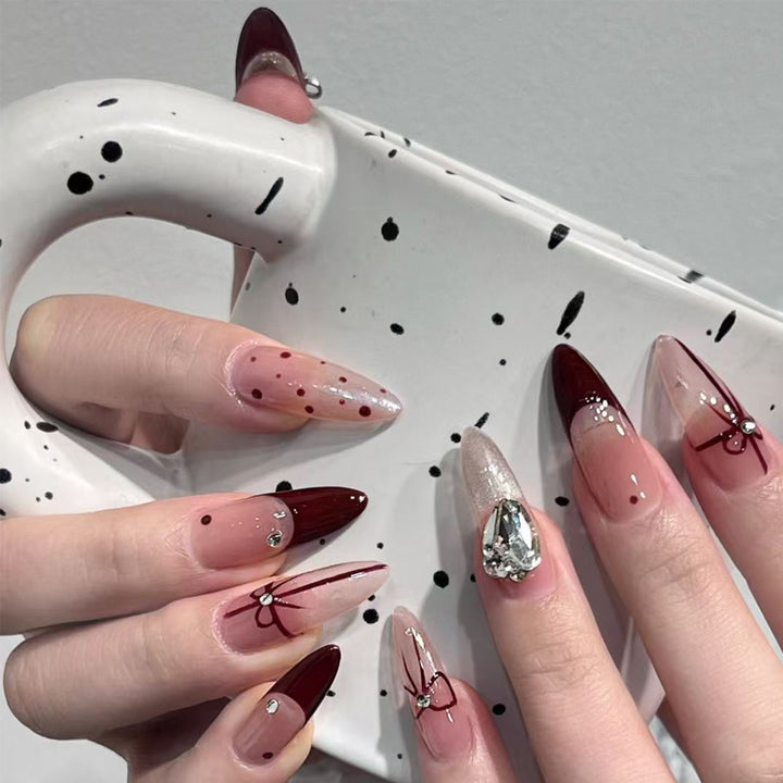 Artificial nail set with elegant bow and glitter details Bowlift