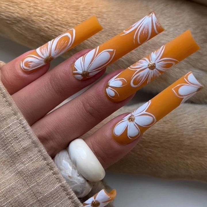 Stylish artificial nails with floral accents Bowlift