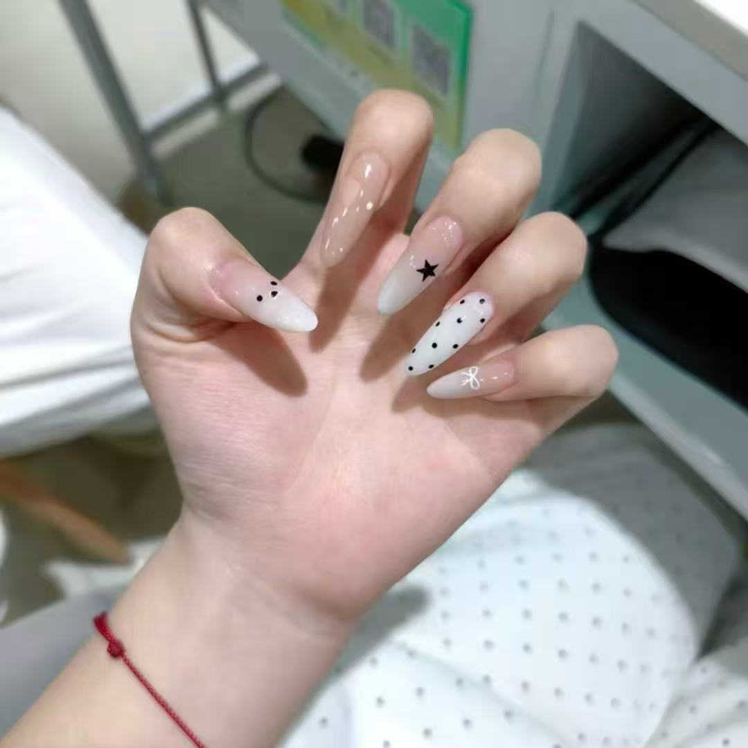 Artistic Press-On Nail Set with Star and Dot Patterns Bowlift
