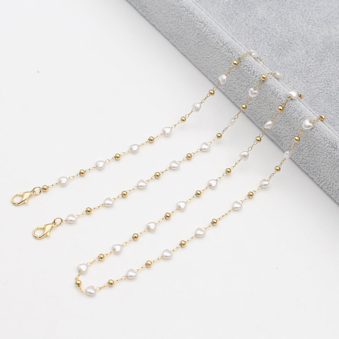 Pearl-Accented Eyewear Chain Bowlift