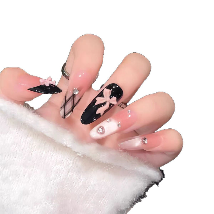 Artistic Press-On Nail Set with Decorative Accents Bowlift