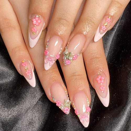 Creative nail art set with playful flower and glitter accents Bowlift