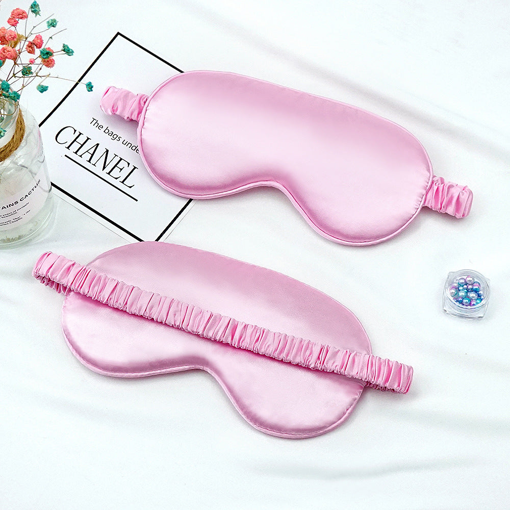Women's breathable satin eye mask with ergonomic curvature, soft padding and gathered anti-slip band Bowlift