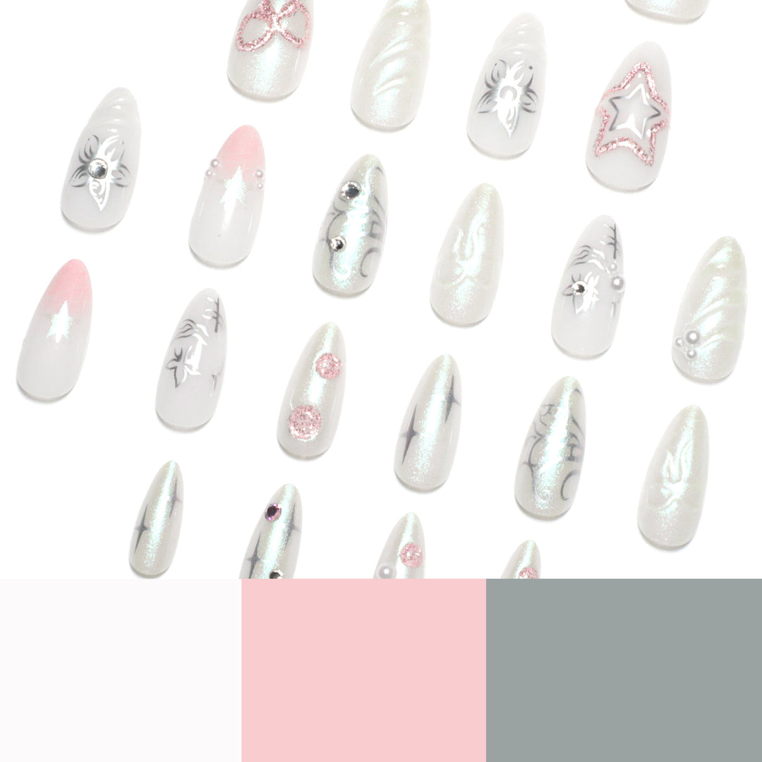 Artistic nail extensions with shiny embellishments Bowlift