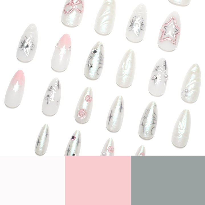 Artistic nail extensions with shiny embellishments Bowlift