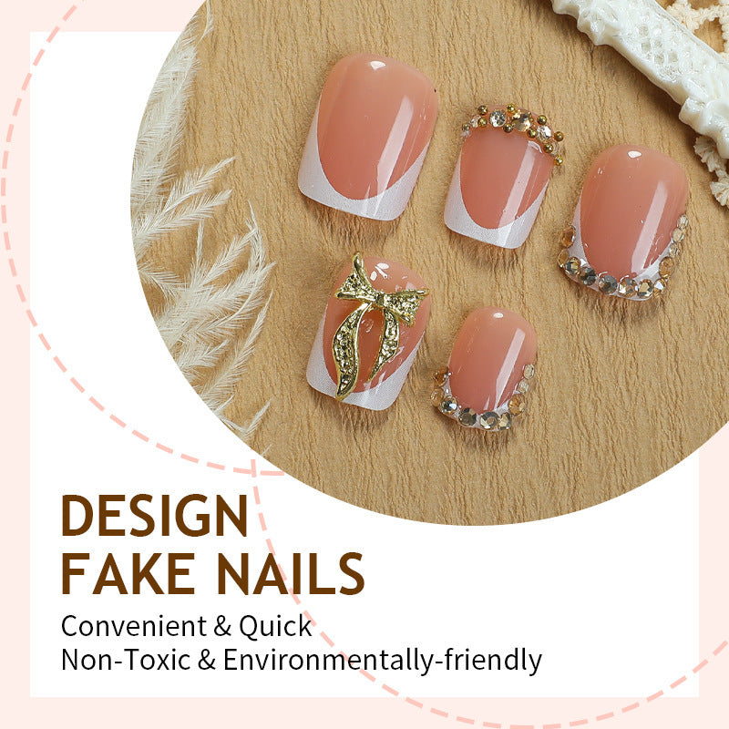 Artificial nail set with elegant glitter and flower decorations Bowlift