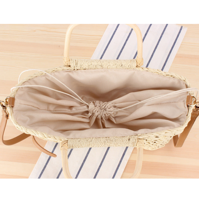 Basket bag with decorative tassel embellishment Bowlift