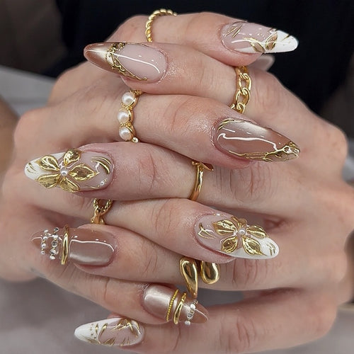 Designer artificial nail set with floral accents and glittering details Bowlift