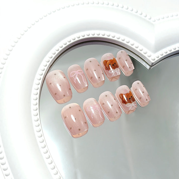 Artificial nails with playful motif decorations Bowlift