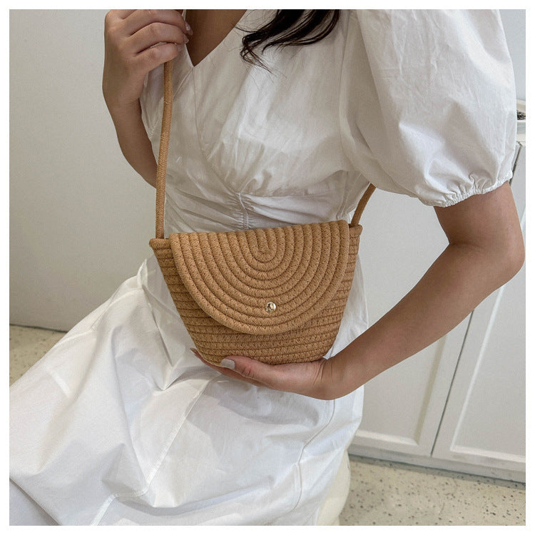 Hand-knotted mini bag with curved design Bowlift