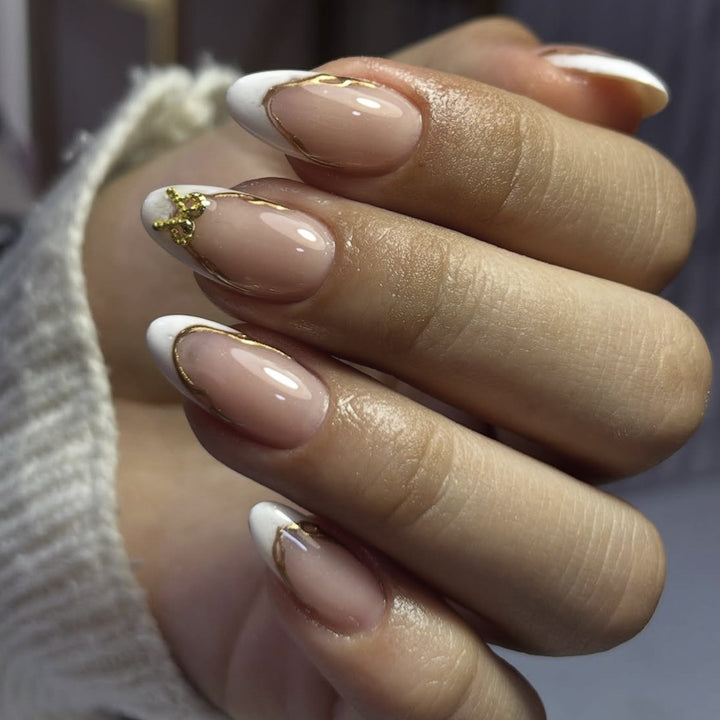 Elegant French Tip Nail Extensions with Gold Accents Bowlift