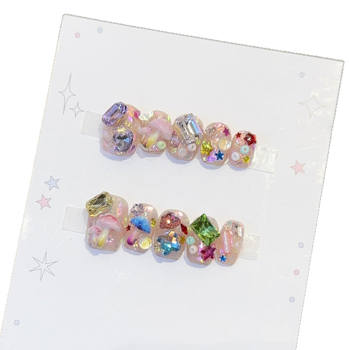 Artificial nails with sparkling crystal accents Bowlift