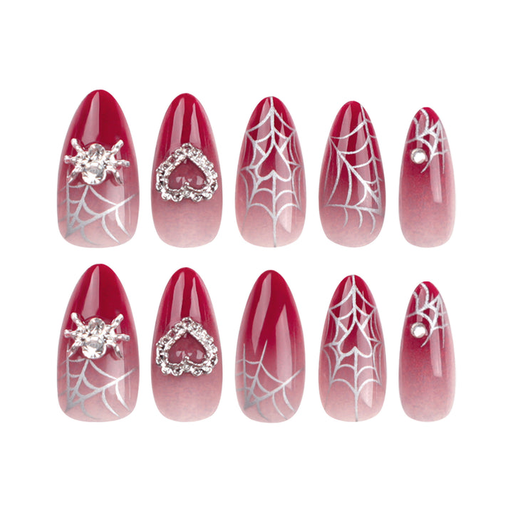 Nail art set with filigree spider web design and glitter accents Bowlift