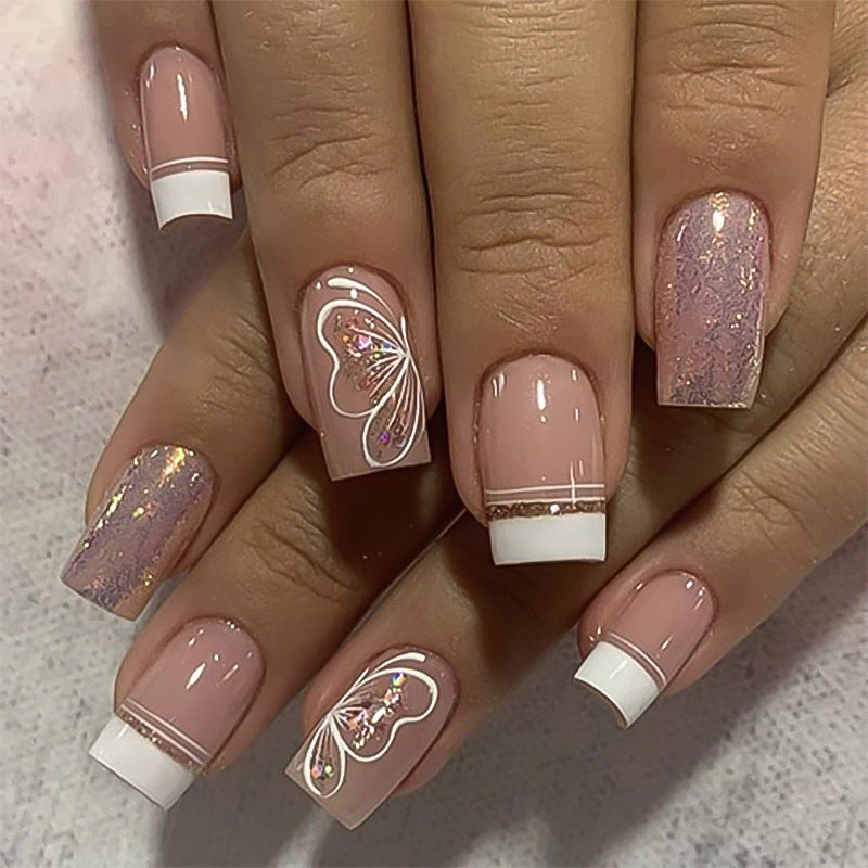 Artful Nail Art with Delicate Butterfly Motif Bowlift