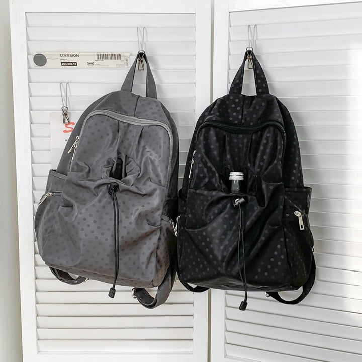 Leisure backpack with functional folding technique and multiple outer pockets Bowlift