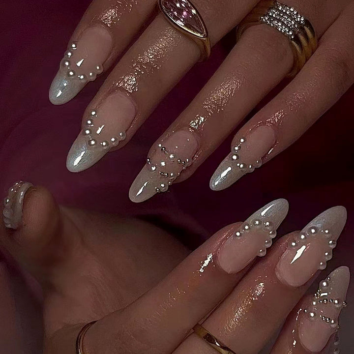 Elegant gel nails with pearl decoration Bowlift