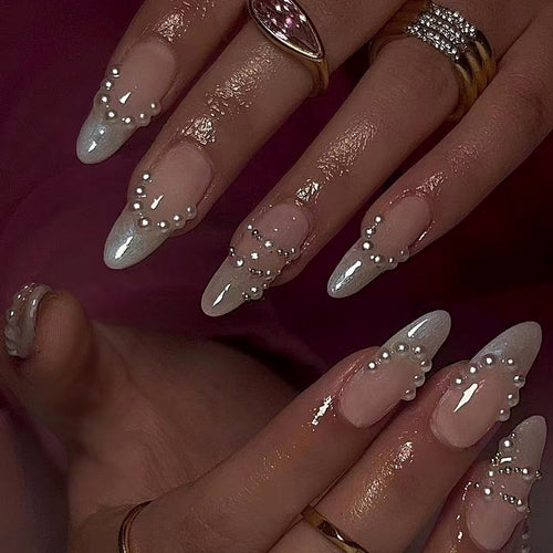Elegant gel nails with pearl decoration Bowlift