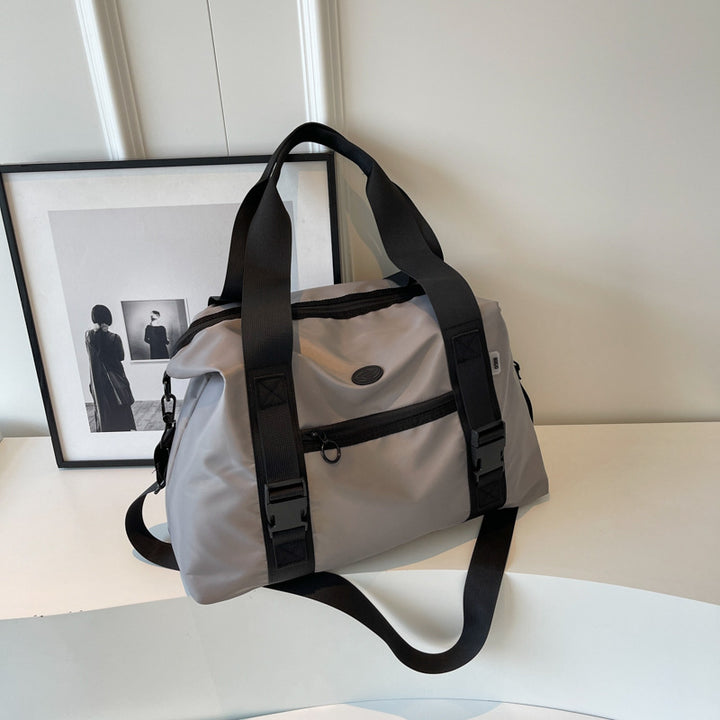 Spacious sports duffel bag with ergonomic carrying handles and water-repellent material Bowlift