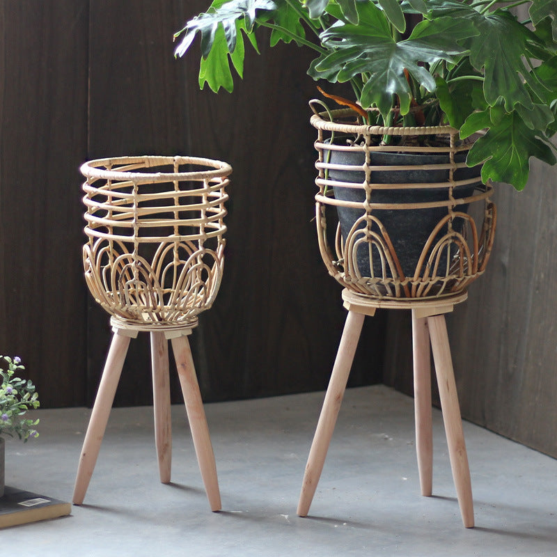 Stylish plant stand made of rattan and wood Bowlift