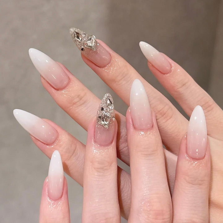 Elegant Stiletto Artificial Nails with Glitter Accents Bowlift