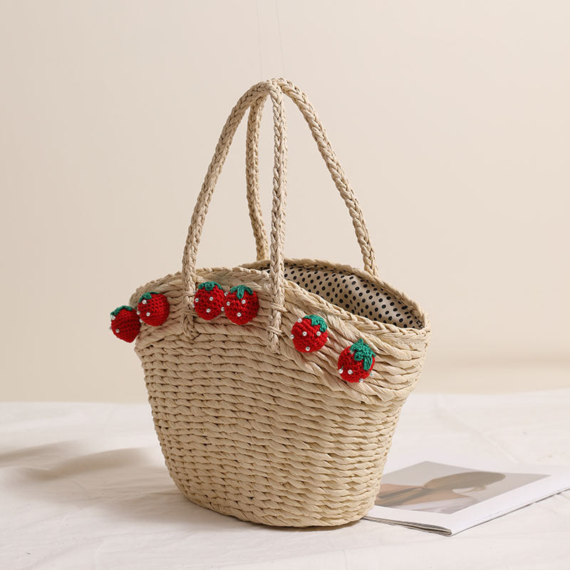 Handmade basket bag with playful strawberry motif Bowlift