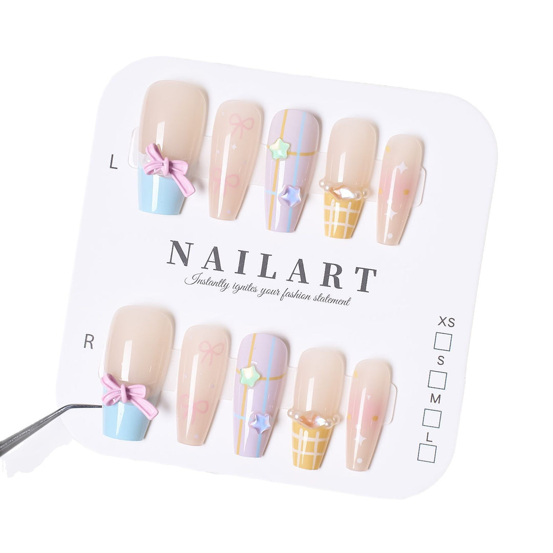 Artistic Press-On Nail Set with Whimsical Designs Bowlift