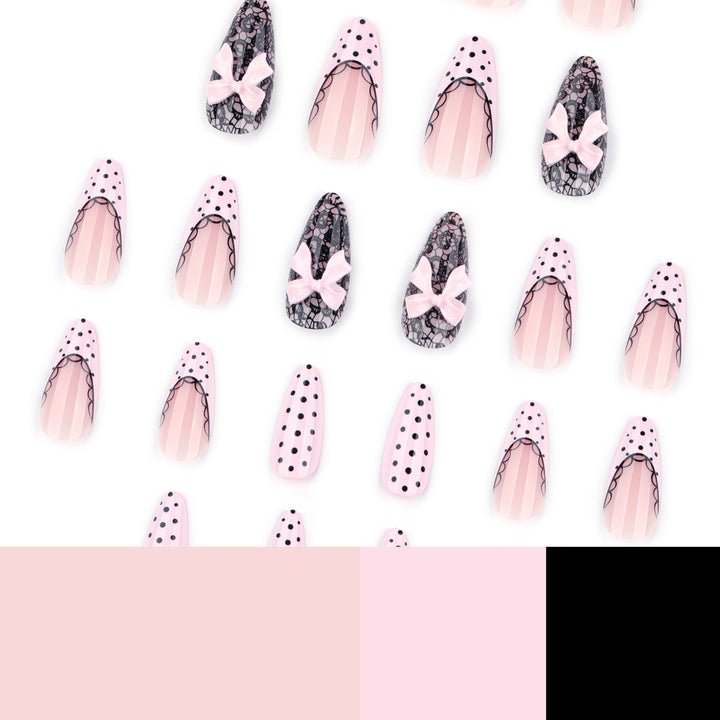 Elegant and artistic stiletto nails with tips and bows Bowlift