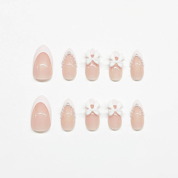 Elegant 3D Bow-Embellished Nail Art Extensions Bowlift
