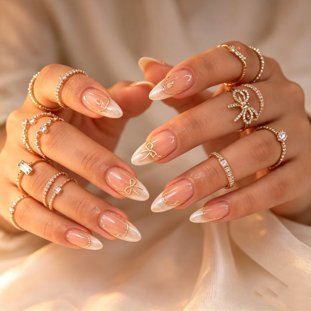 Elegant Stiletto Press-On Nails with Metallic Accents Bowlift