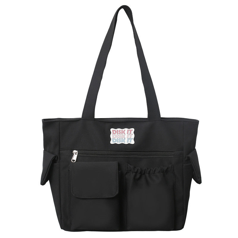 Tote bag with versatile compartments and ergonomic design Bowlift
